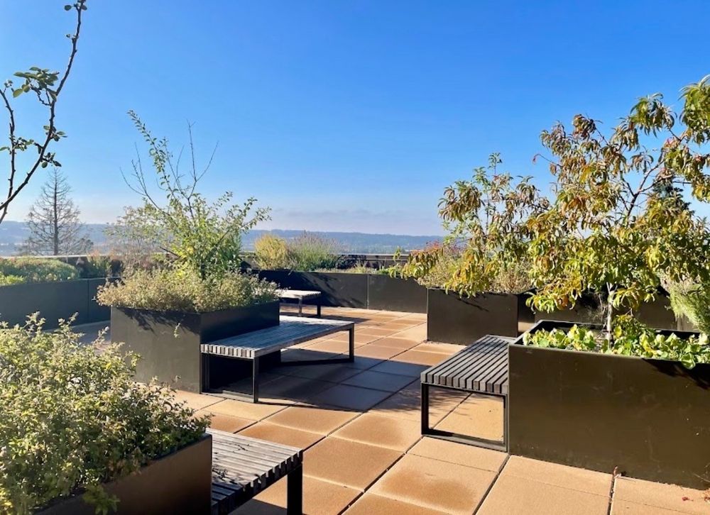 Anderson Roofing offers Paver roof systems, often using pedestal pavers or lightweight composite pavers, turn flat roofs into functional, durable, and aesthetic spaces like terraces or walkways. for Anderson Roofing in Portland, OR