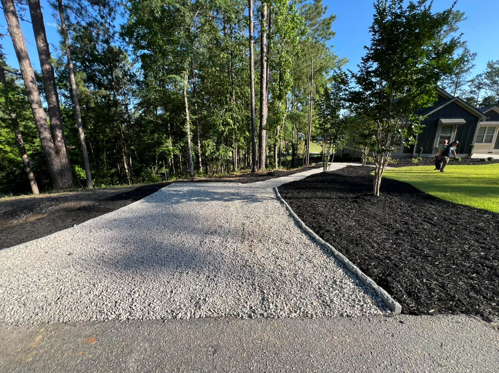 Enhance your home's appeal with our professional gravel driveway installation. We ensure durability, proper drainage, and a smooth finish tailored to your landscape for long-lasting functionality and aesthetic charm. for Clarks Hill Property Solutions in McCormick, SC