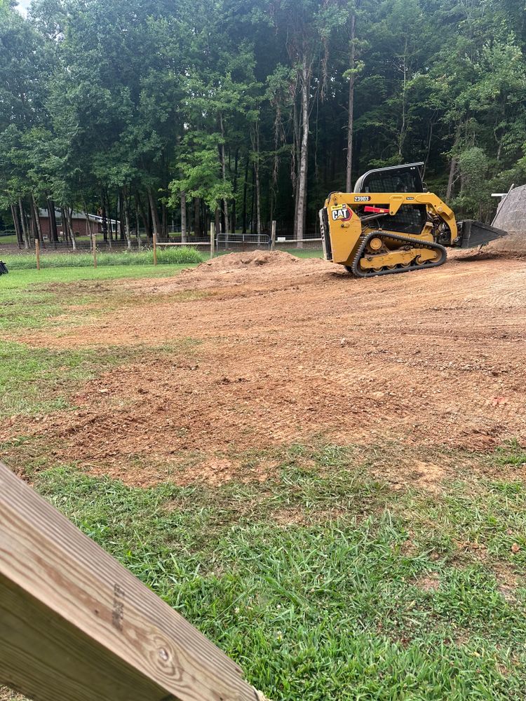 Our Property Grading service ensures your land is level and correctly sloped for optimal drainage and stability, enhancing the overall appearance, functionality, and value of your property. for Three Rivers Dirt Works LLC in Knoxville, TN