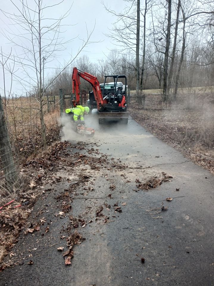 Our Excavating service complements your fall and spring clean up by preparing land for landscaping, ensuring a smooth transformation process with precise digging and grading tailored to your property's unique needs. for CODE 3 Landscaping & Lawn Care in  Leoma,  TN