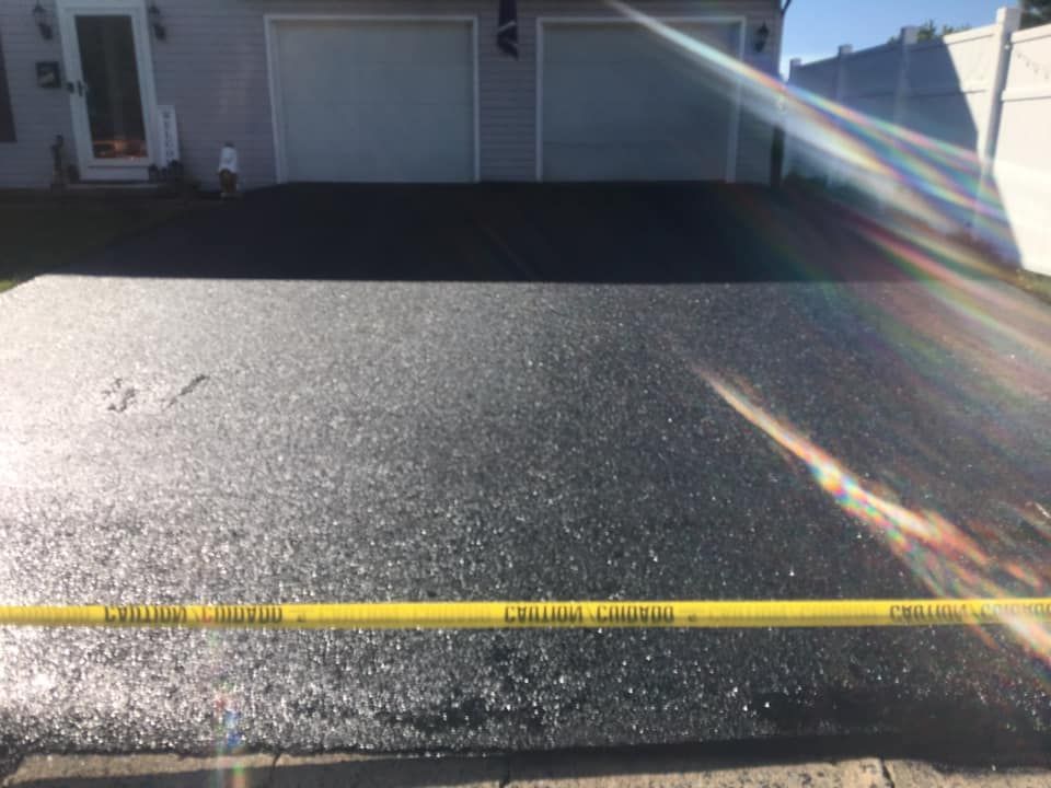 Protect your driveway from damage caused by weather and daily wear with our professional sealcoating service. Extend the lifespan of your asphalt surface and enhance its appearance for lasting curb appeal. for Mike's Macadam in Reading, PA