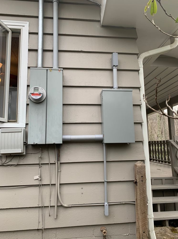 Enhance your home's safety and efficiency with our Electrical Panel Upgrades. Our expert electricians ensure a seamless transition to modern solutions for improved performance and compliance with current electrical standards. for 828 Electrical, LLC in Boone, NC