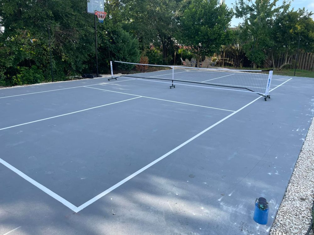 Enhance your home with our custom pickleball courts, expertly designed and painted to create the perfect playing surface. Enjoy personalized colors and quality craftsmanship right in your backyard for endless fun! for Ferrell’s Professional Painting & Home Services LLC in Panama City Beach, FL