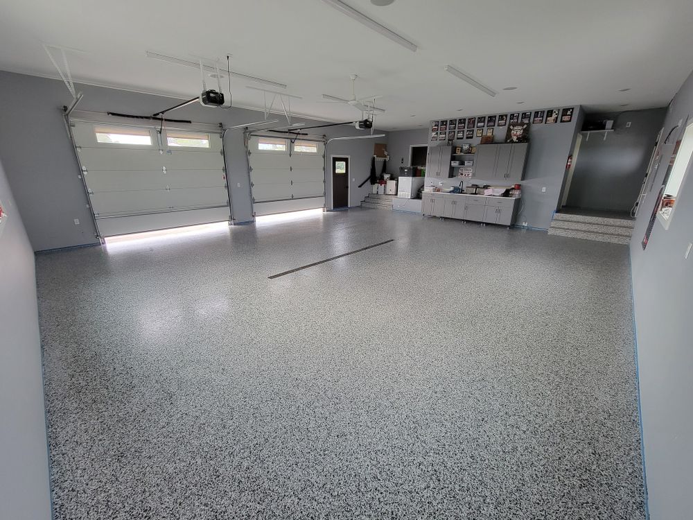 Enhance your home's concrete surfaces with our durable Polyaspartic Chip Coating, offering a seamless finish that's resistant to stains, UV damage, and daily wear while ensuring long-lasting beauty and functionality. for Majestic Concrete and Landscape in Cross Lake, MN