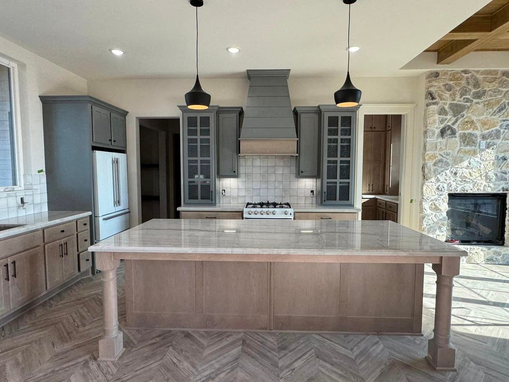 Transform your home with our professional kitchen services. Our experienced team will transform your space, enhancing functionality and style while providing top-notch craftsmanship for a stunning culinary haven. for CWC Custom Homes & Barndominiums in Snook, TX