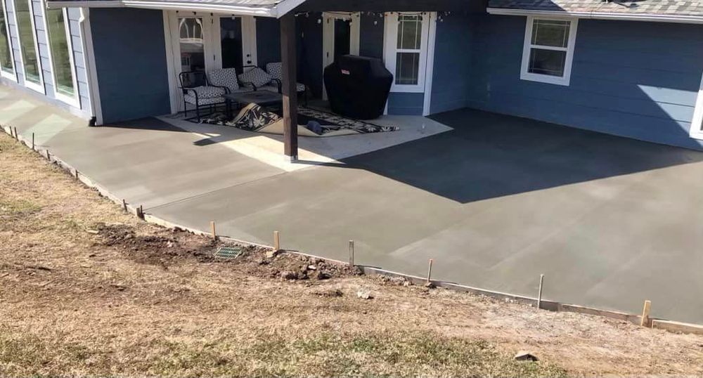 Transform your outdoor living space with our Patio Design & Installation service. Our expert team will work with you to create a beautiful and functional patio that enhances your home's aesthetic appeal. for MTZ Concrete Services in Tulsa, OK