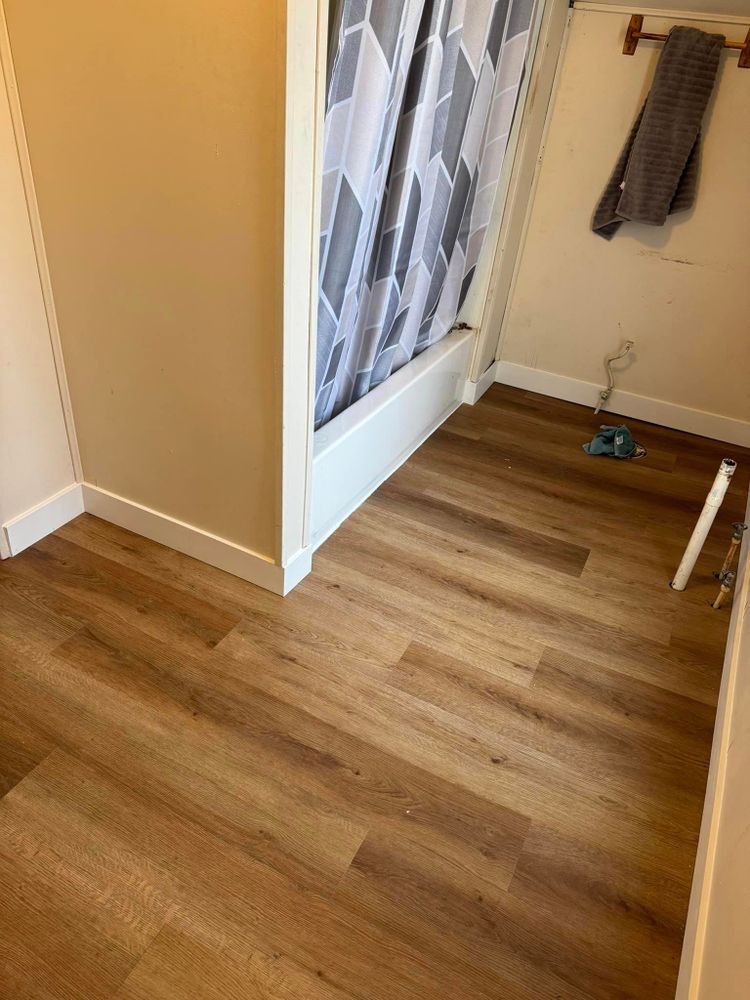 Our expert Trim Work service enhances the beauty of your flooring by meticulously installing baseboards, crown molding, and other finishing touches to create a polished and cohesive aesthetic in your home. for Reds Flooring in Boonville, IN