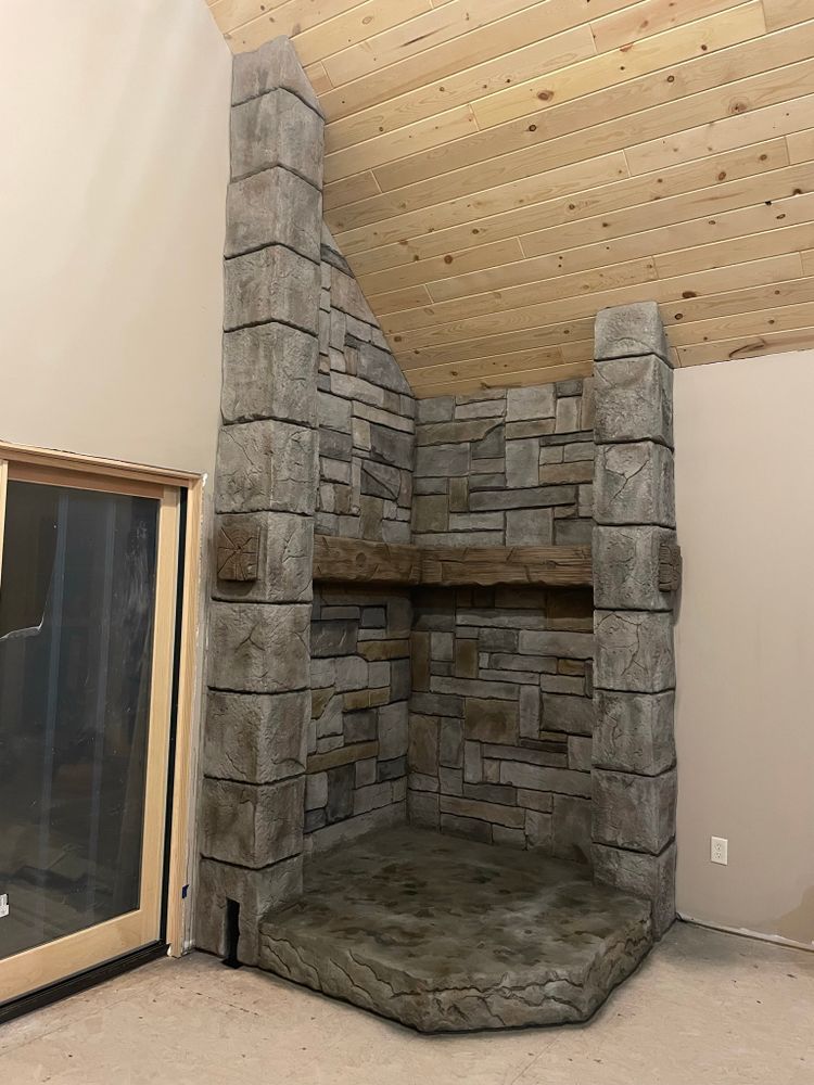 Interior fireplace & feature walls  for STAMPEDE Vertical Concrete in Isanti, Minnesota