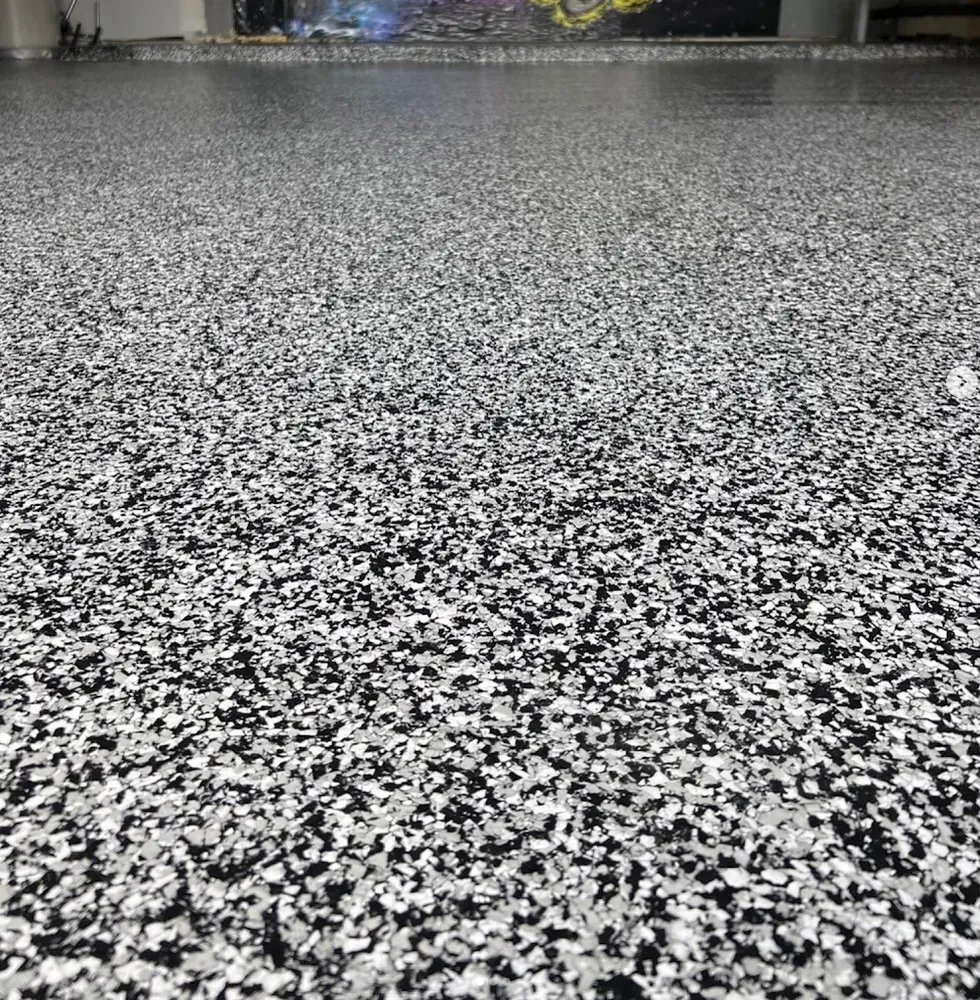 Transform your floors with our Flake System Epoxy, offering a durable, decorative finish that is perfect for garages and basements. Enjoy enhanced beauty and long-lasting protection in any part of your home. for Imperial Wood & Epoxy Flooring in Houston, TX