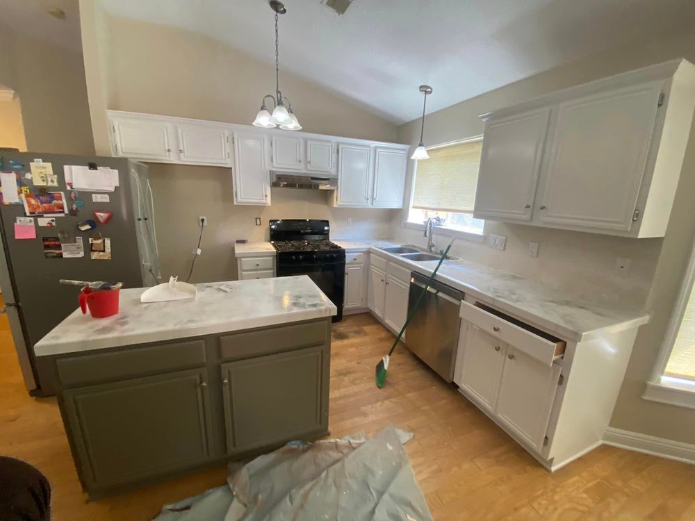 Our Kitchen and Cabinet Refinishing service offers homeowners a cost-effective option to transform and revitalize their kitchen cabinets, bringing new life to the heart of their home. for Conquer Painting & More in Albuquerque, NM