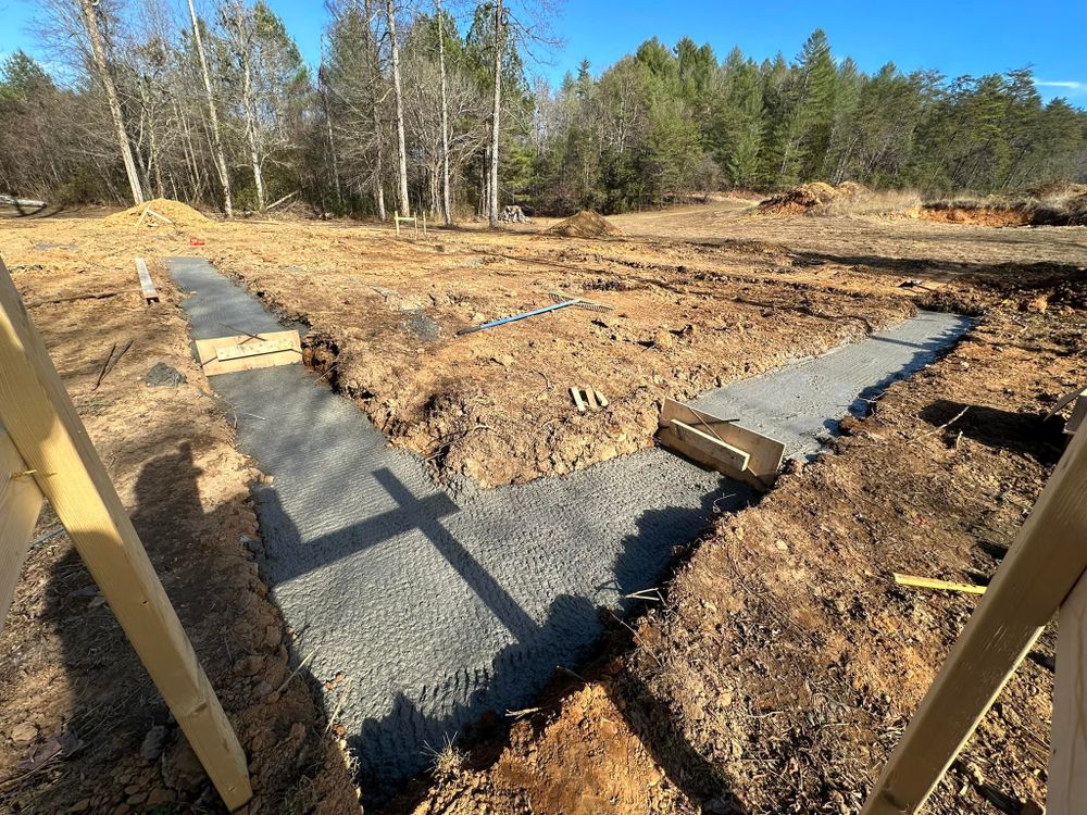 Our Footers service ensures your deck footers are sturdy and reliable, providing a strong foundation for your outdoor space while enhancing safety and longevity of your decking project. for TN DIRT PROS in Cleveland, TN