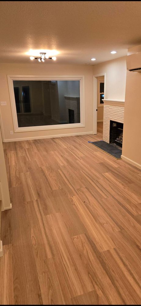 Transform your home with our expert flooring services. We offer a wide range of high-quality materials, precise installation, and exceptional craftsmanship to enhance the beauty and durability of your space. for Bisila Construction in Vancouver, WA