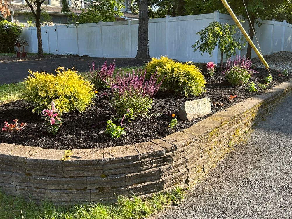 Enhance your garden's health and appearance with our professional mulch installation service, designed to retain moisture, suppress weeds, and enrich soil while adding a polished look to your landscape. for Sanchez Home Services in Pompton Lakes, NJ