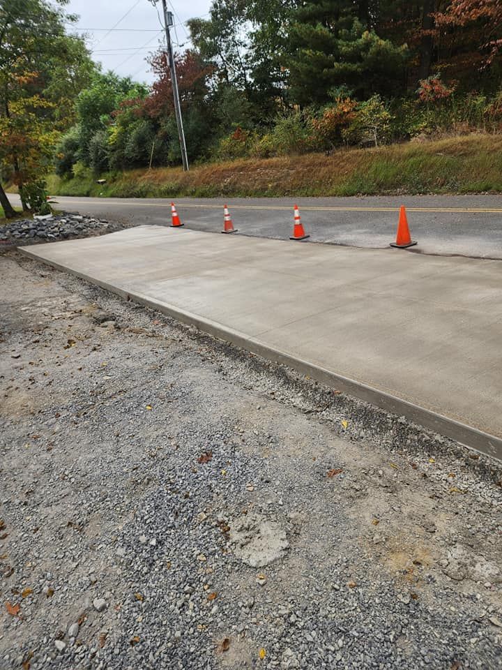 Our Concrete Slabs & Services provide durable, level foundations for garages, sheds, patios, and more. We handle excavation, grading, pouring, and finishing with precision to ensure long-lasting results. for Heckman Hauling & Excavating in Nescopeck, PA