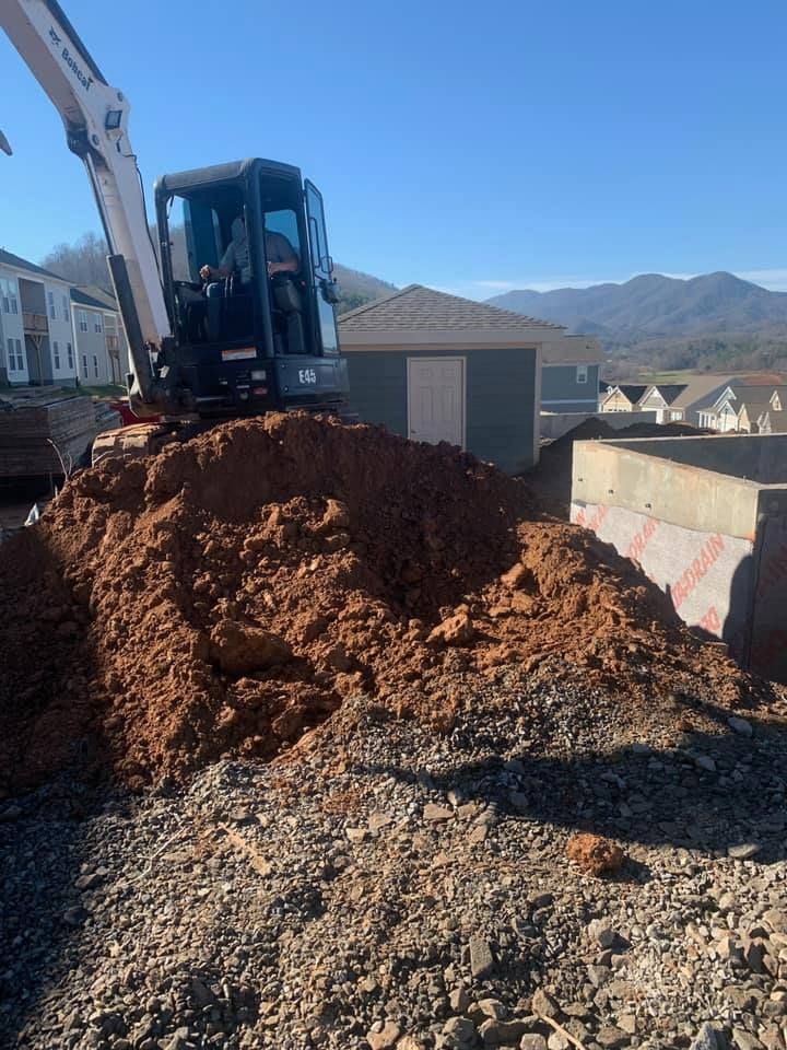 Our leveling service ensures a smooth, stable foundation for your construction projects by precisely grading and flattening the land, enhancing drainage and structural integrity for lasting results. Ideal for residential developments. for Boyd’s Grading in Fruitland, NC