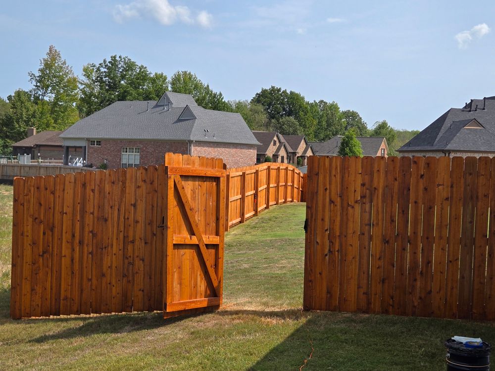 Fence staining for Patriot Fence  in Oakland, TN