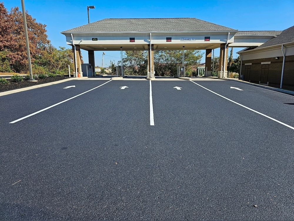 Enhance your home's curb appeal with our professional driveway paving service, offering durable and smooth asphalt solutions tailored to withstand any weather while providing a polished, attractive entrance to your property. for Stripe A Lot in Knoxville, TN