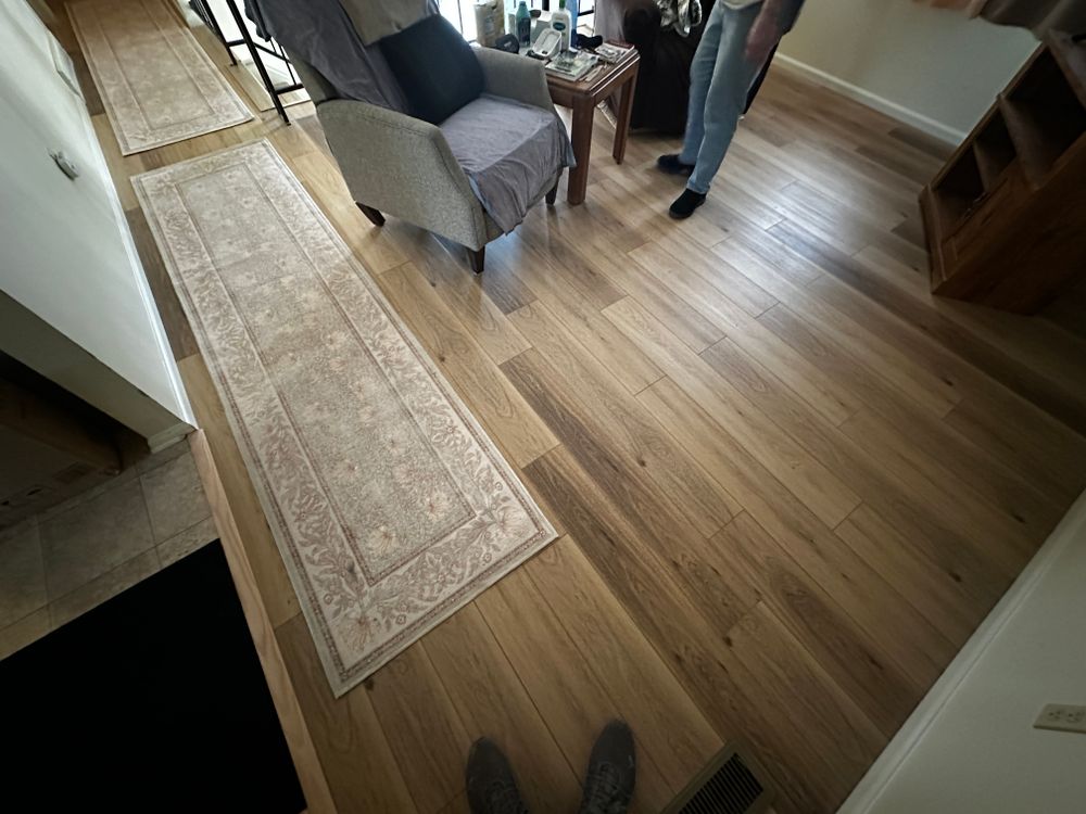 Our expert team specializes in installing Floating Laminate Flooring and Luxury Vinyl Planks, providing homeowners with durable, stylish flooring solutions that transform spaces efficiently and beautifully at competitive rates. for Happy Home Projects Co-op in Lakewood, CO