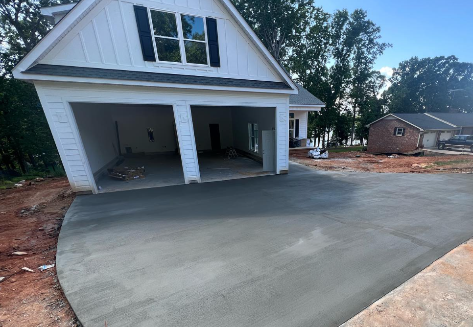 Enhance your home's stability with our garage solutions, expertly designed to complement house foundations. Trust our concrete expertise for durable and secure garages that seamlessly integrate with your property’s foundation. for JIF Concrete Services in Greenville, SC