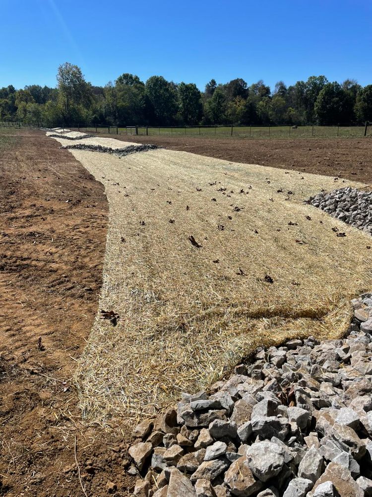 Our Drainage Solutions and Water Remediation services effectively manage water flow, preventing damage to your property. We can effectively capture problematic water through French Drains, Swales, ditches, or just properly regrading. for TrottCo Excavation in Shelbyville, TN