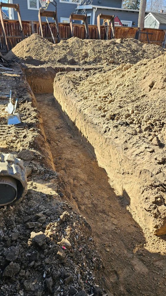 Our Dirt Work service offers homeowners precise excavation and land grading, ensuring a stable foundation for construction projects while enhancing drainage and landscaping for improved property aesthetics and functionality. for Gemini Construction & Excavating LLC in Evans, CO