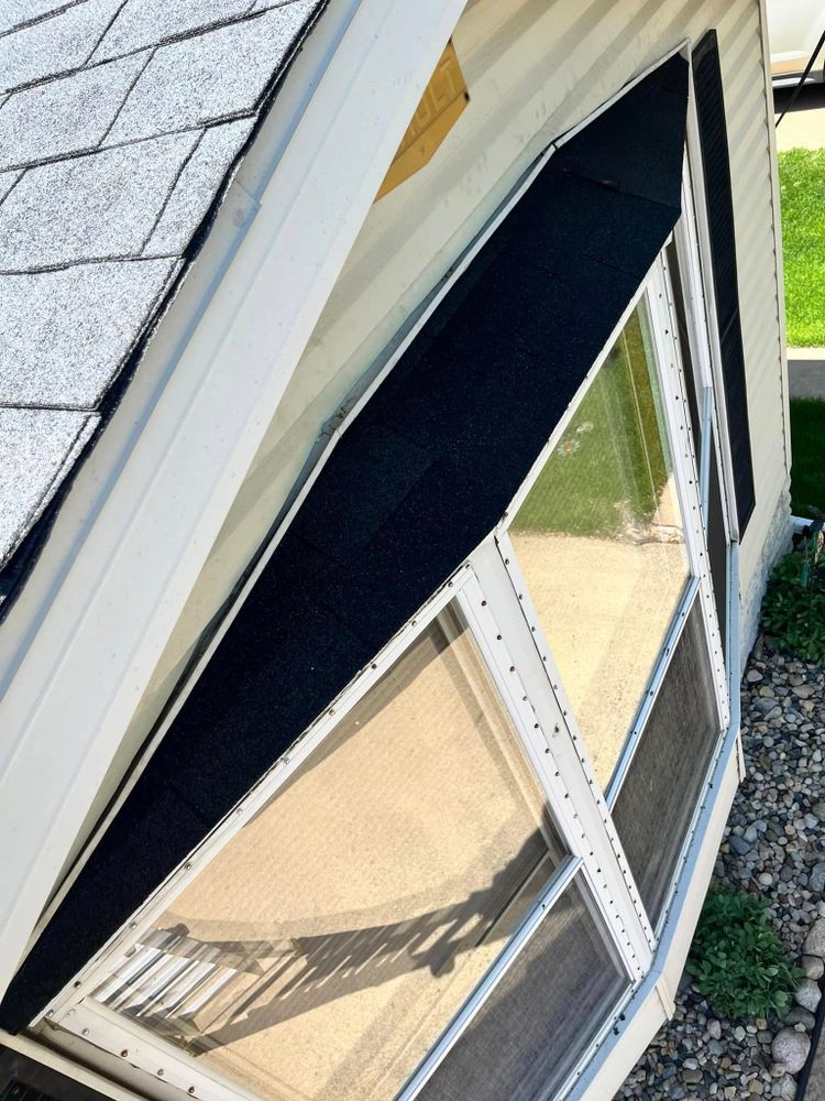 Our Roofing Repairs service offers professional assessments and expert solutions to fix leaks, damaged shingles, and other roofing issues promptly, ensuring the safety and longevity of your home’s roof. for Ultimate Exteriors in Beloit, WI