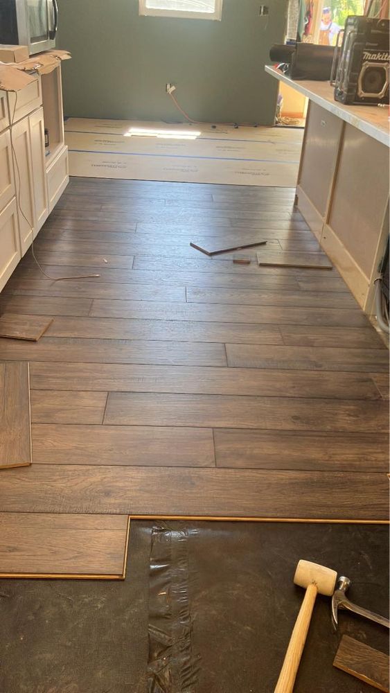 Our expert Flooring service offers a wide range of high-quality options to transform your home. From hardwood to carpet, we provide professional installation and exceptional customer service for stunning results. for Quality Home Repair and Improvement  in Saint John, Indiana