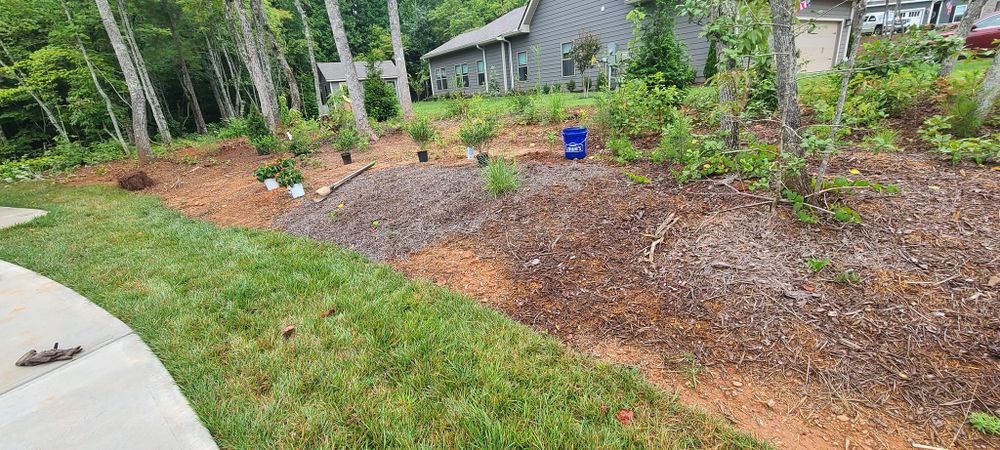 Our Fall and Spring Clean Up service includes raking leaves, removing debris, trimming bushes, and preparing your lawn for the changing seasons to maintain a beautiful landscape year-round. for JC Landscapers in Ellijay, GA