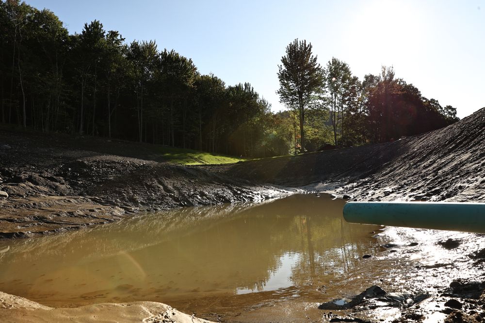 Carving a Pond into a Mountain Side for Andy Naylor Excavation in Johnson, VT