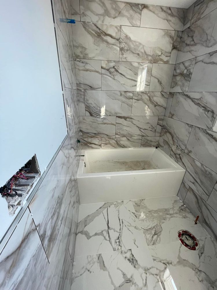 Our expert tiling service transforms your home with precision and style, offering a wide selection of tile options to enhance durability and aesthetic appeal for any room. for New Jersey Building Contractor LLC in Washington Township, New Jersey