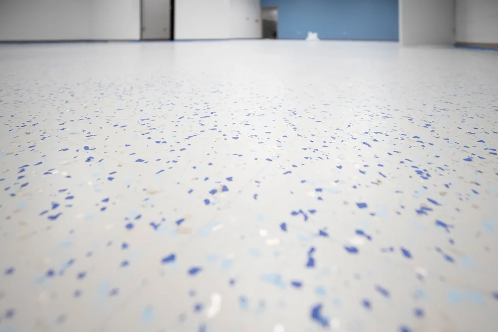 Enhance your home's flooring with our Polyaspartic Floor Coating service: offering a durable finish that's resistant to stains and UV damage while curing quickly for minimal disruption to your space. for Fade Out Lines, LLC in Chapin, SC