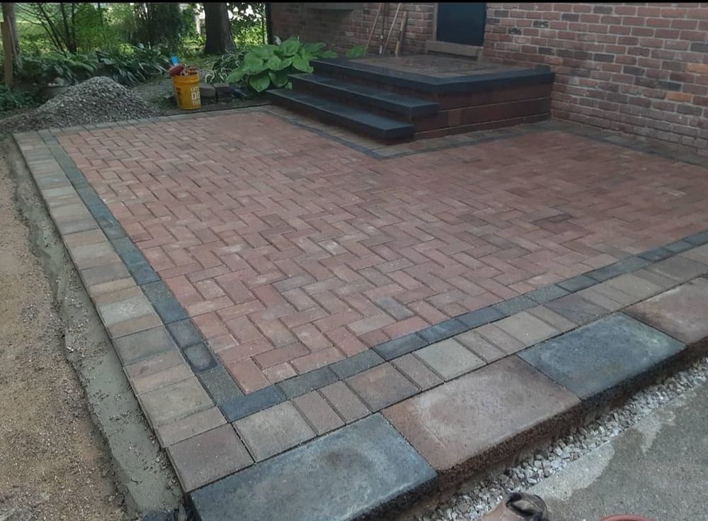 Our Brick Pavers service offers durable and visually appealing hardscaping solutions for your outdoor spaces. Enhance the beauty of your property with our professionally installed brick paver designs. for The Stone Garden in Farmington Hills, MI