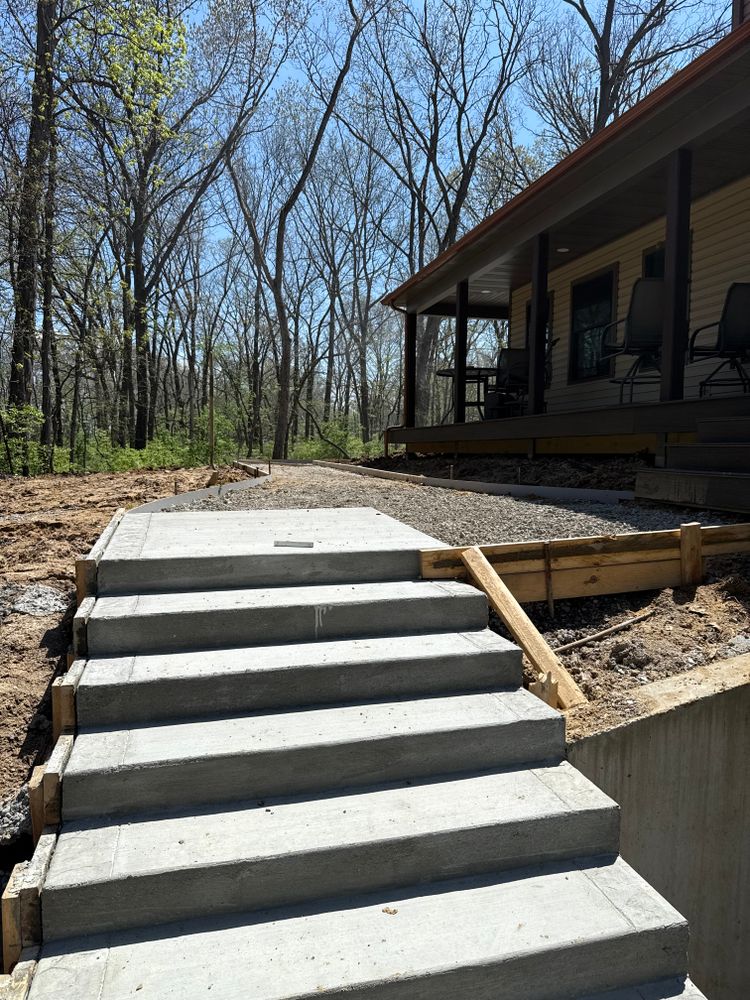 Transform your home's interior with our custom stair design and installation service. Our experts craft elegant concrete staircases that combine durability, functionality, and style to enhance any living space. for Immaculate Concrete and Construction in Troy, IL