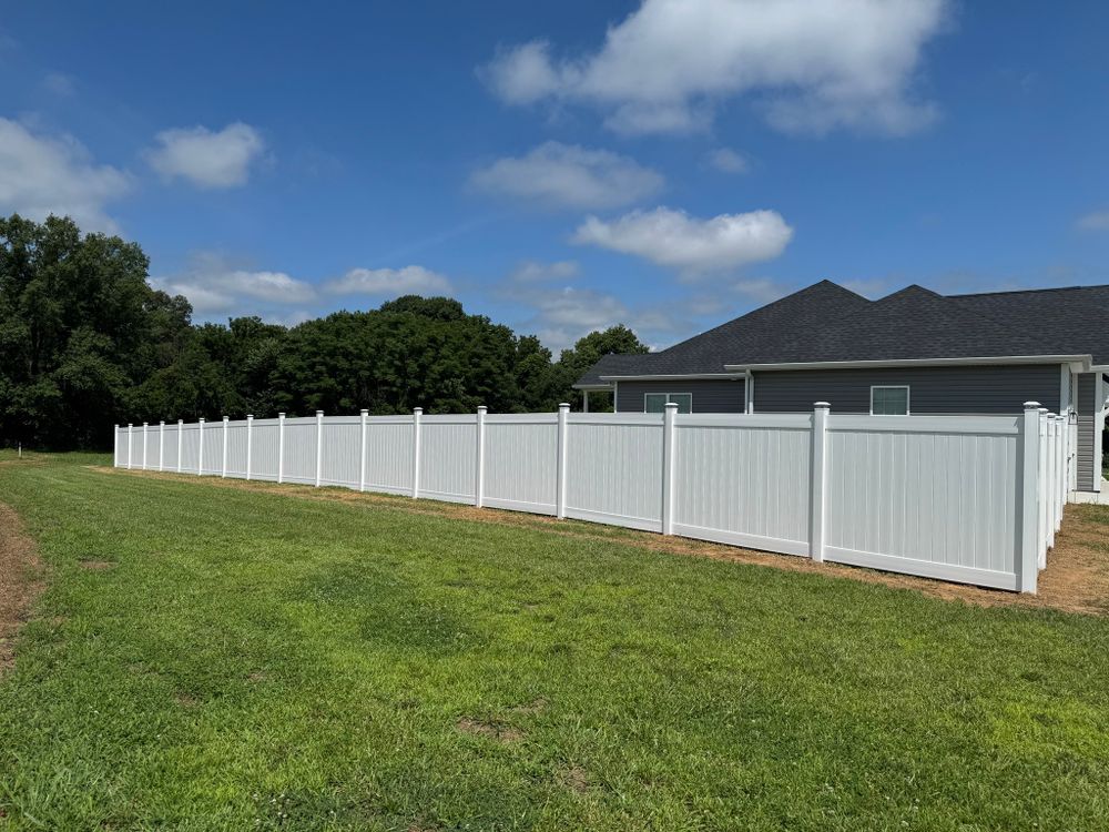 Enhance your home's privacy and style with our durable vinyl fencing solutions. Enjoy low maintenance and a variety of designs tailored to seamlessly blend with your outdoor space while ensuring long-lasting protection. for NPS Fence, LLC in Champaign, Illinois