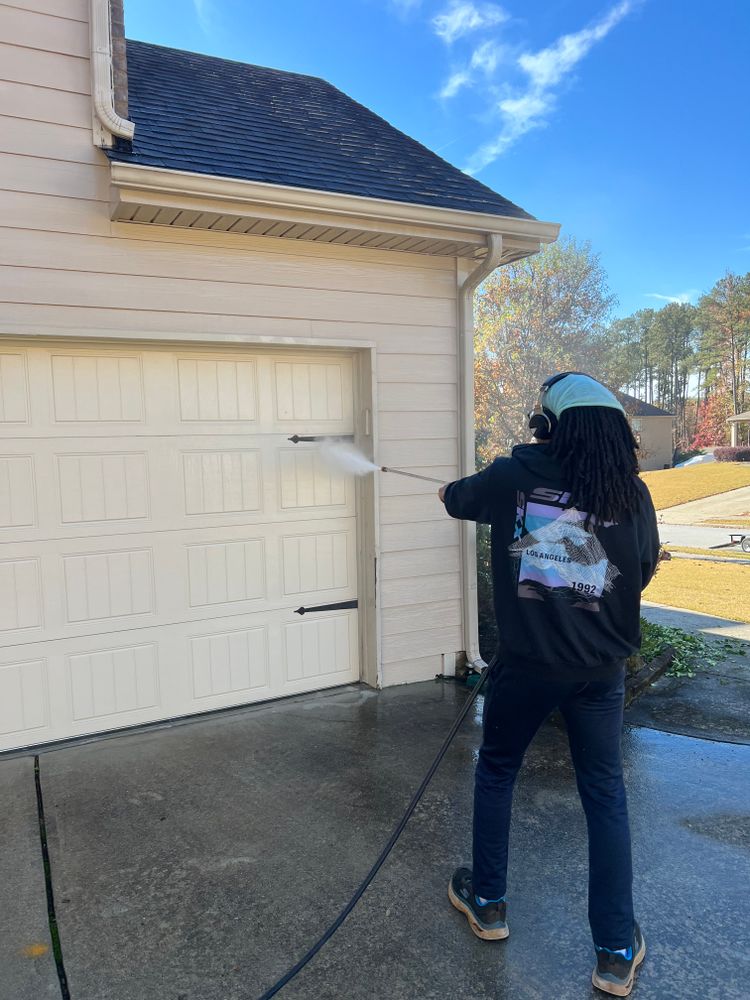 Our Pressure Washing service efficiently removes dirt, grime, and stains from various surfaces around your home, restoring their cleanliness and enhancing the overall appearance. for Prime Lawn LLC in Conyers, GA