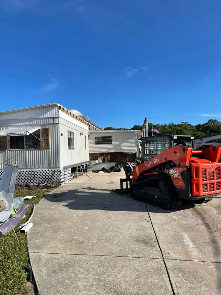 Transform your outdoor space with our Skid Steer Work service, offering efficient earthmoving, grading, and site preparation to enhance landscapes and hardscapes for a pristine finish on your property. for All hands construction in Altamonte Springs, Florida