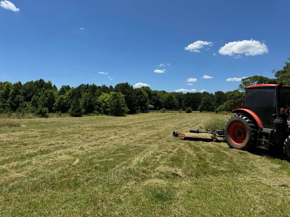 Our professional mowing service ensures a perfectly manicured lawn, enhancing your home's curb appeal. We offer reliable scheduling, expert care, and attention to detail for a pristine outdoor environment. for Thin Green Line Landscaping & More in Laurens, SC