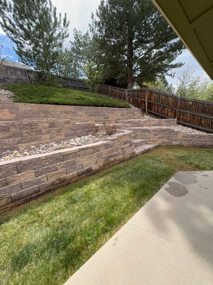 Our retaining wall construction service creates strong, attractive walls that prevent erosion, manage slopes, and enhance your landscape’s beauty, giving homeowners lasting function, stability, and curb appeal for outdoor spaces. for Denver Bros Lawn Control in Denver, CO