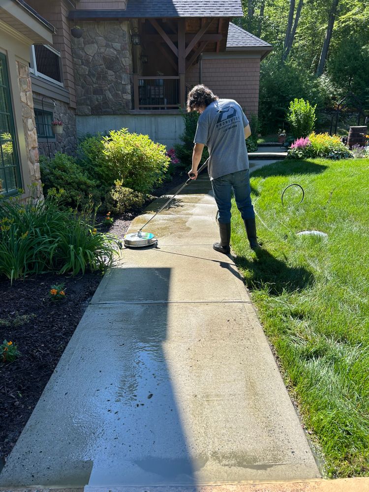 Enhance your home's curb appeal with our expert hardscape maintenance service, ensuring pristine patios, driveways, and walkways through meticulous cleaning, repairs, and sealing to extend longevity and beauty. for Pronovost Landscaping & Irrigation in Palmer, MA