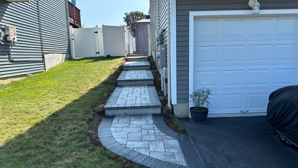 Enhance your home with our expert walkway Installation service, providing durable, beautifully crafted walkways that combine functionality and style to elevate curb appeal and ensure safe entry to your residence. for Greenscaping & Masonry LLC in Bethel, CT