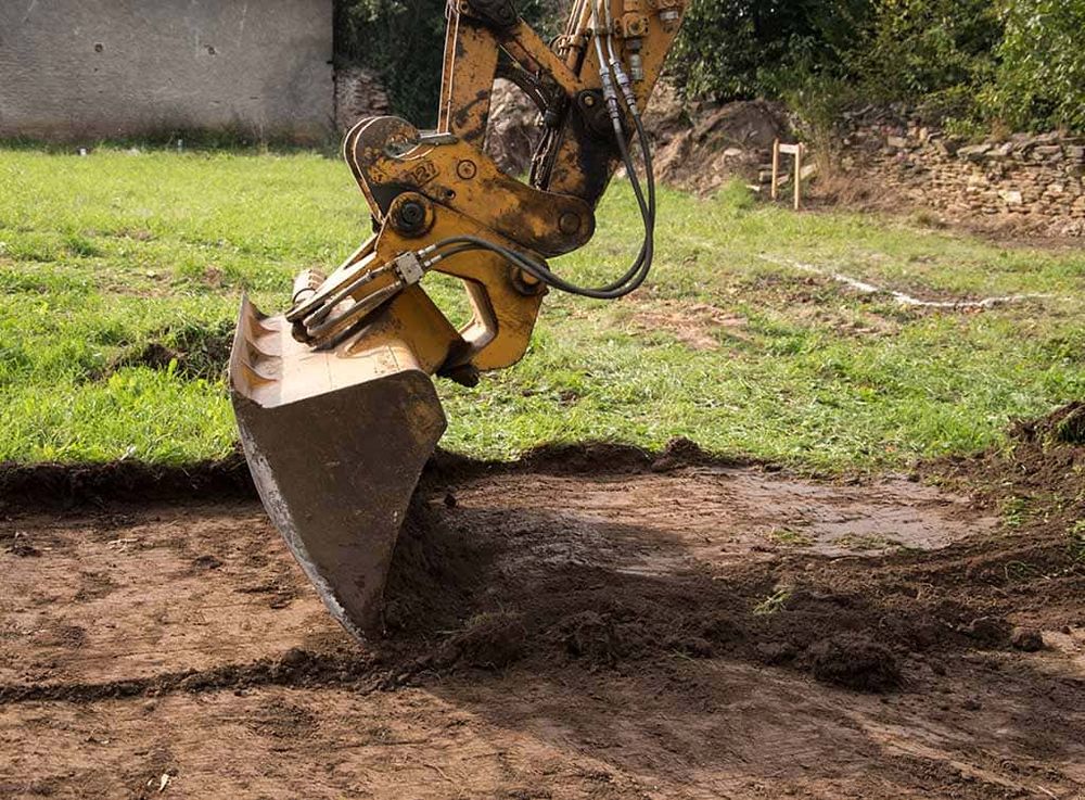 Our Leveling service ensures your land is precisely graded for construction, promoting stability and preventing drainage issues. Trust our experts to create a solid foundation for your next home project. for West Tennessee Excavation in Ripley, TN