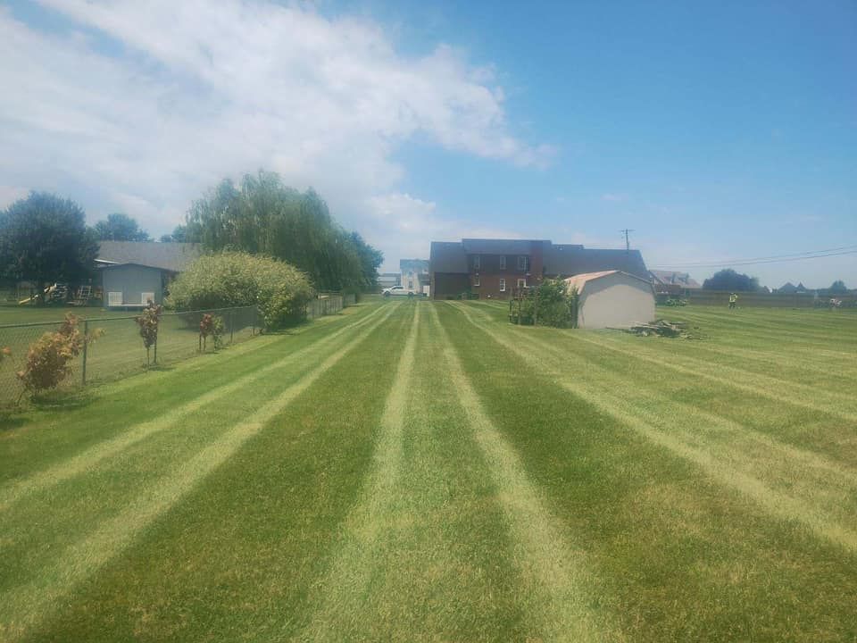 Our mowing service ensures a perfectly manicured lawn, enhancing your home's curb appeal. We offer reliable scheduling and precise care, providing a lush, healthy landscape for you to enjoy year-round. for Richards Lawn and More in Richmond,  KY