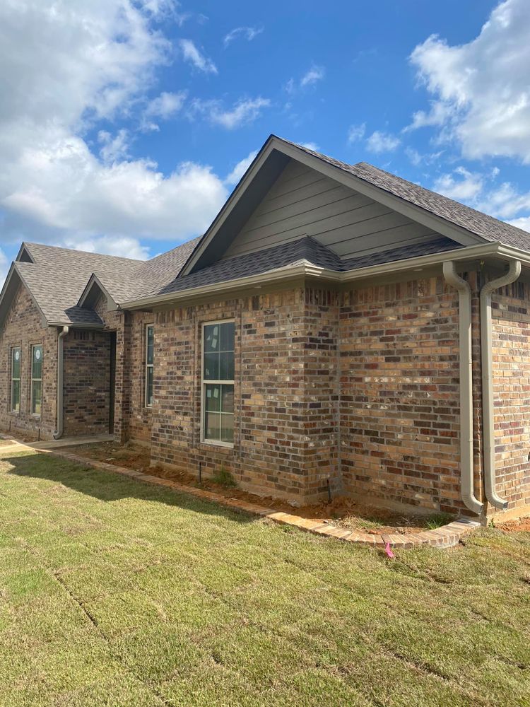 Our expert roofing installation team ensures seamless gutter integration, protecting your home from water damage with high-quality materials and precise craftsmanship for lasting durability and enhanced property value. for Bobcat Gutters in Longview, TX