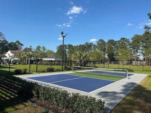 Enhance your backyard with our custom Sport Courts, offering durability, versatility, and professional installation. Perfect for basketball, tennis, or multi-sport use; tailored to fit your space and athletic needs. for Out Back Pool and Spa Creations in The Woodlands, TX