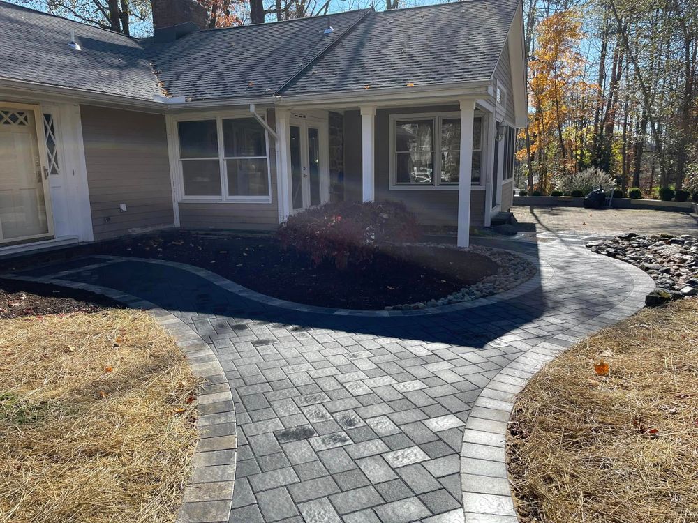 Enhance your home's beauty and security with our expert landscape lighting solutions. Our commercial landscaping team ensures tailored designs that brighten pathways, highlight features, and add elegance to any outdoor setting. for DNA Landscapes in Hackettstown, NJ