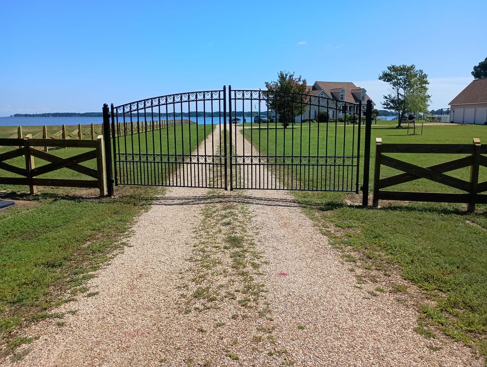 Our Gate Installation and Repair service ensures secure, durable, and aesthetically pleasing gates tailored to your property needs. Trust our skilled professionals for quality craftsmanship and reliable solutions for enhanced curb appeal. for Fence Masters in Gloucester County, VA