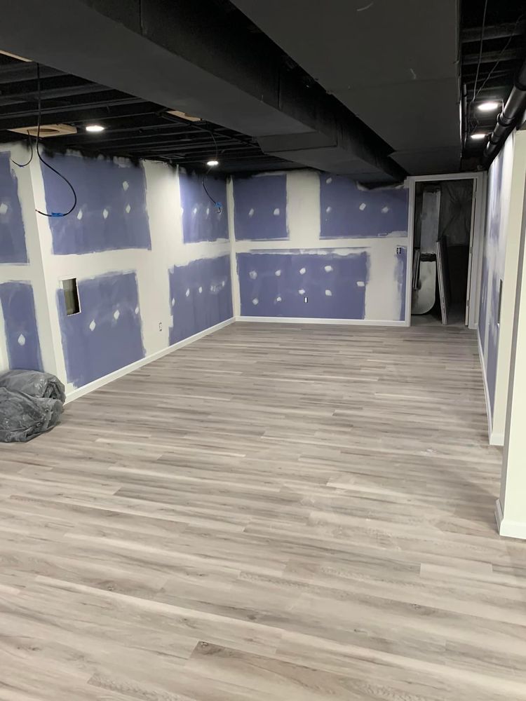 Our Finish Basement service transforms your unused space into a functional and beautiful living area. From framing to drywalling and flooring, we'll create the basement of your dreams. for Watson's Handyman Services in Genesee County, MI