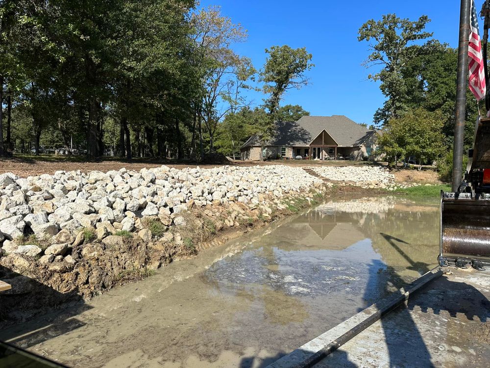 Our professional dredging service removes sediment and debris, improving drainage, preventing flooding, enhancing aesthetics, and providing access to your lake during fluctuating water levels, giving you valuable time on the water back. for BR Construction LLC  in Corsicana, TX