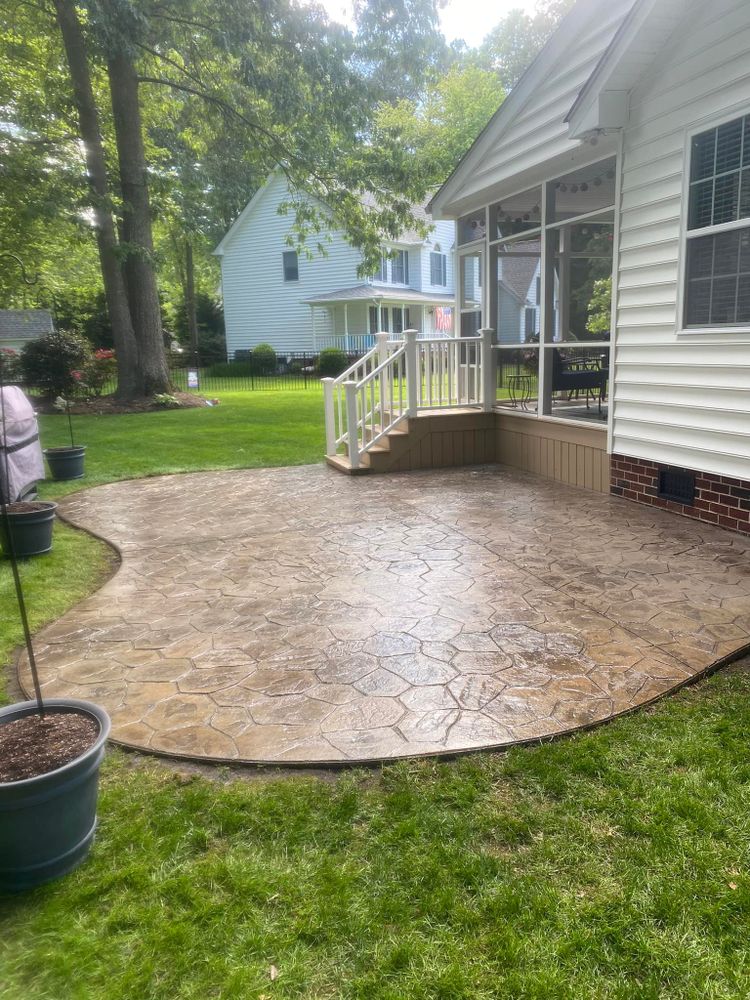 Our Concrete Cleaning service restores the look of your driveway, patio, and walkways by removing dirt, grime, and stains using high-pressure water to leave surfaces looking fresh and new. for Coastline Services  in Chesapeake, VA