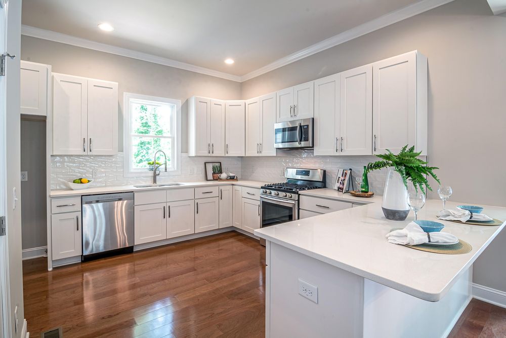 Our Kitchen and Cabinet Refinishing service can update the look of your home without the cost of replacing cabinets. Transform your space with a fresh new finish today! for Powell Painting in Daytona Beach,  FL